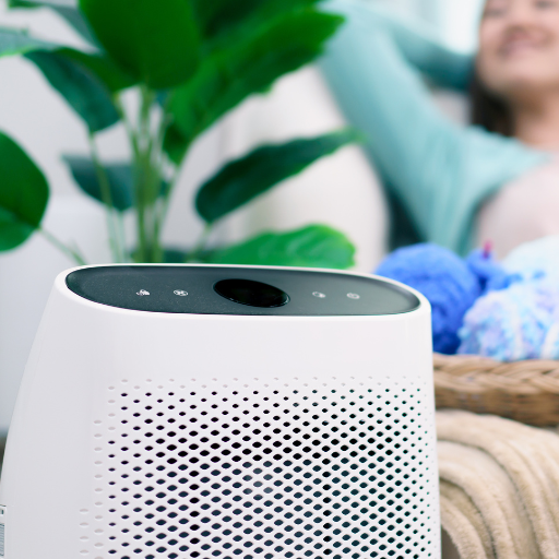 How do air conditioners and dehumidifiers impact indoor air quality