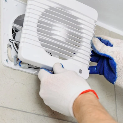 How do dehumidifiers and exhaust fans affect bathroom ventilation?