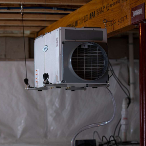 How do dehumidifiers improve basement air quality?