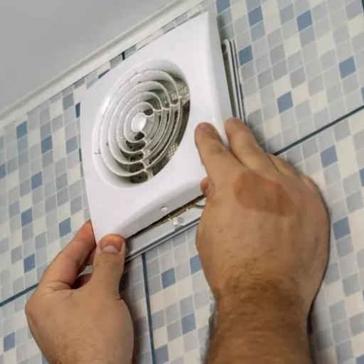 How do you address persistent moisture issues in bathrooms without electrical outlets?
