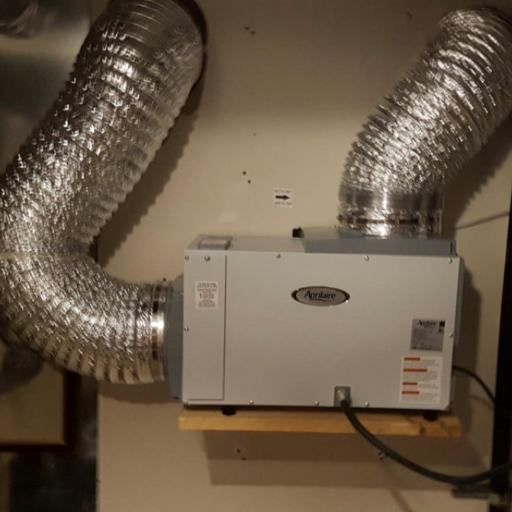 How do you maintain and optimize your ducted dehumidifier for maximum efficiency?