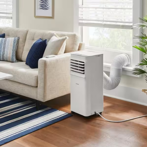 How does a portable dehumidifier compare to an air conditioner?