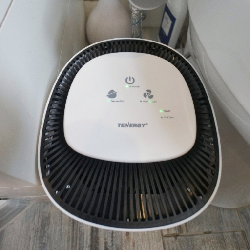 What's the difference between a bathroom dehumidifier and an exhaust fan?